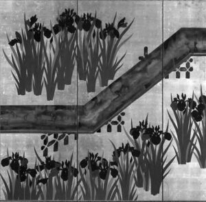 a bridge separates many flowers