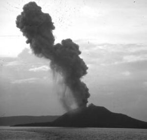 photo of an eruption of smoke from a volcano