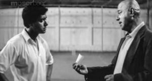 photo of two men speaking