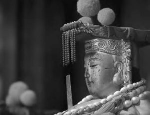 close up photo of a statue of a woman's head