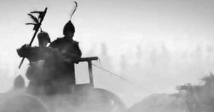 photo of two people on a chariot