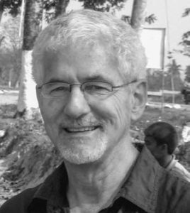 photo of a white middle aged man in glasses 