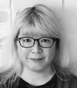 photo of a woman in glasses smiling