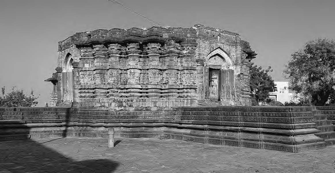 photo of a temple made from stone. it looks like the temple is made of ridges, like that would be made from water erosion
