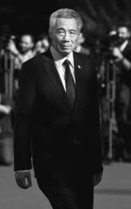 black and white photo of an older man in a suit