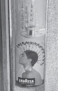 photo of a person's side profile wearing a feathered headdress