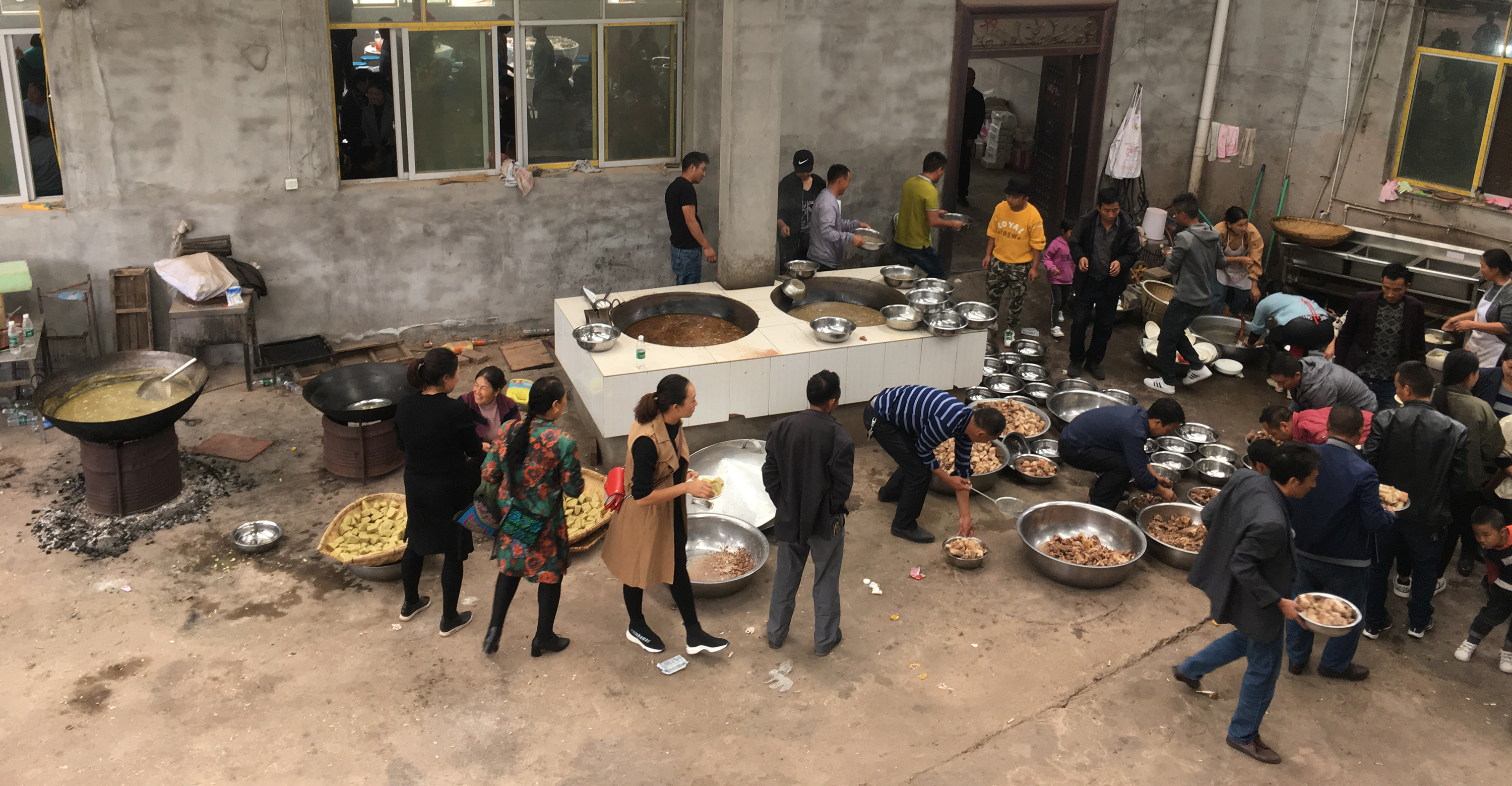  Preparing a Nuosu communal feast in Liangshan, Sichuan Province.