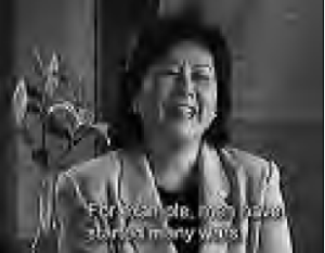 photo of a middle aged woman laughing