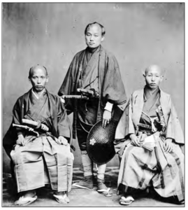 Photo of three Japanese men with traditional costumes