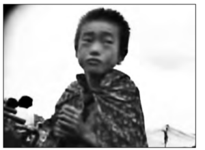 Image of a boy with sad face