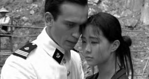 a man in military uniform and a woman