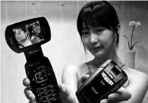 Image of a girl showing two cell phones